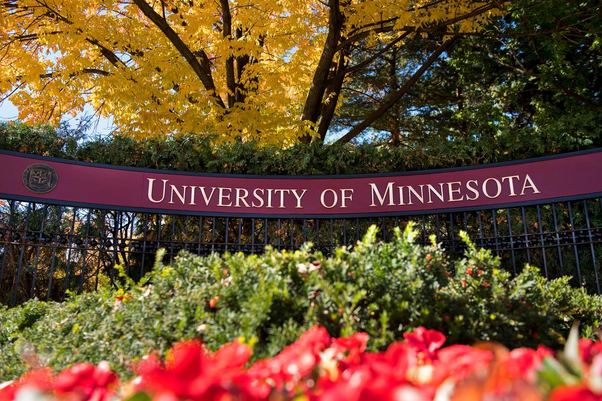 Maroon University of Minnesota Campus Welcome Sign in Spring